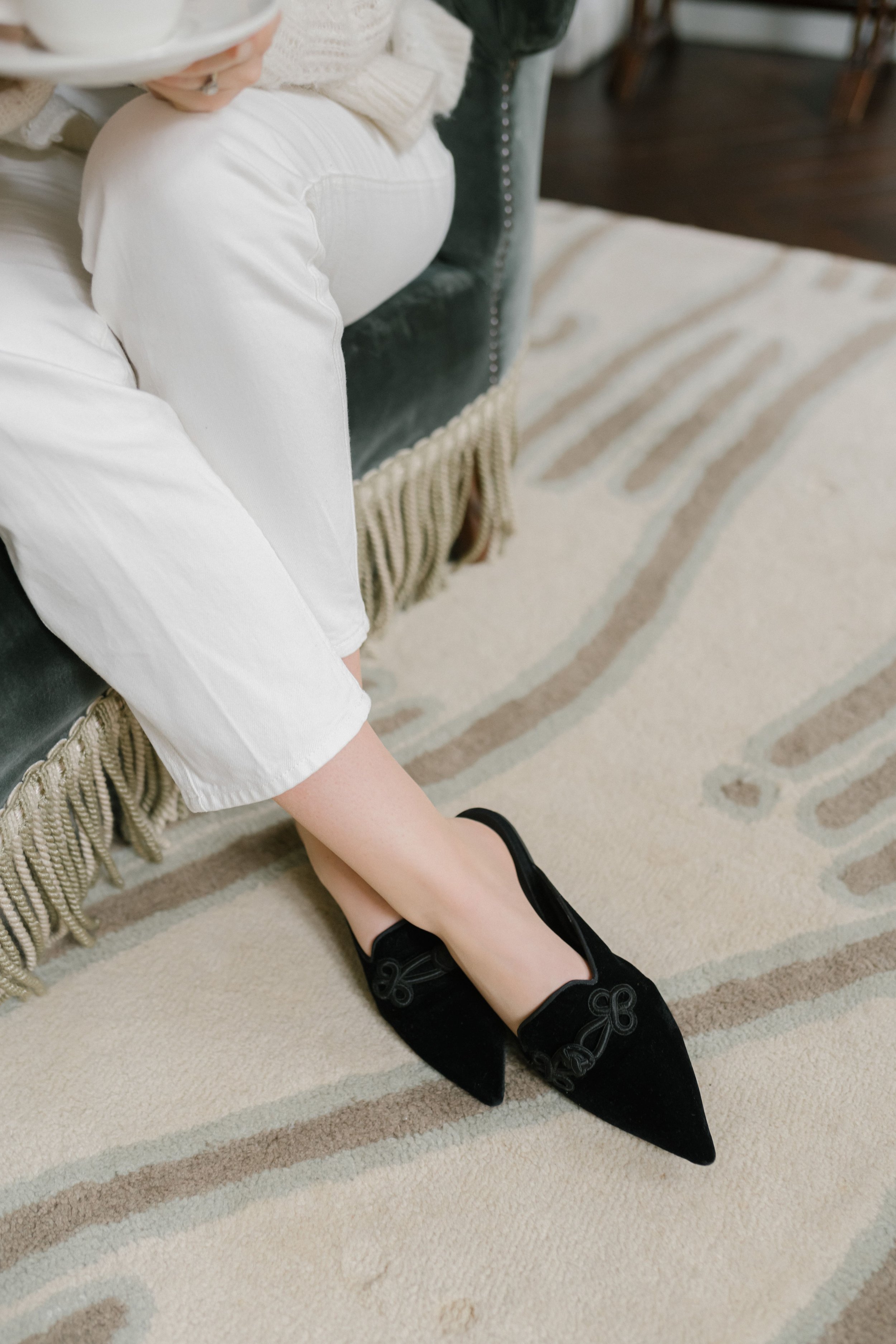 Elegant black loafers on parisian carpet .jpg