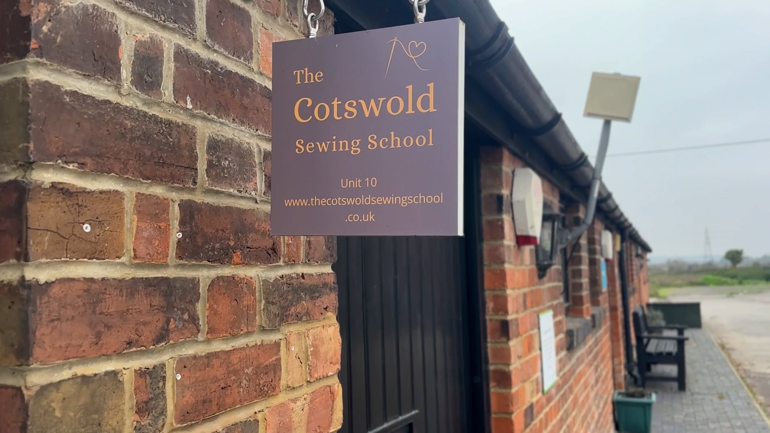 The Cotswolds Sewing School's door sign.jpg